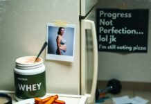 The Best Nutrition Tips for Muscle Gain and a Stronger Body Messy kitchen with chicken, protein tub, and dumbbell